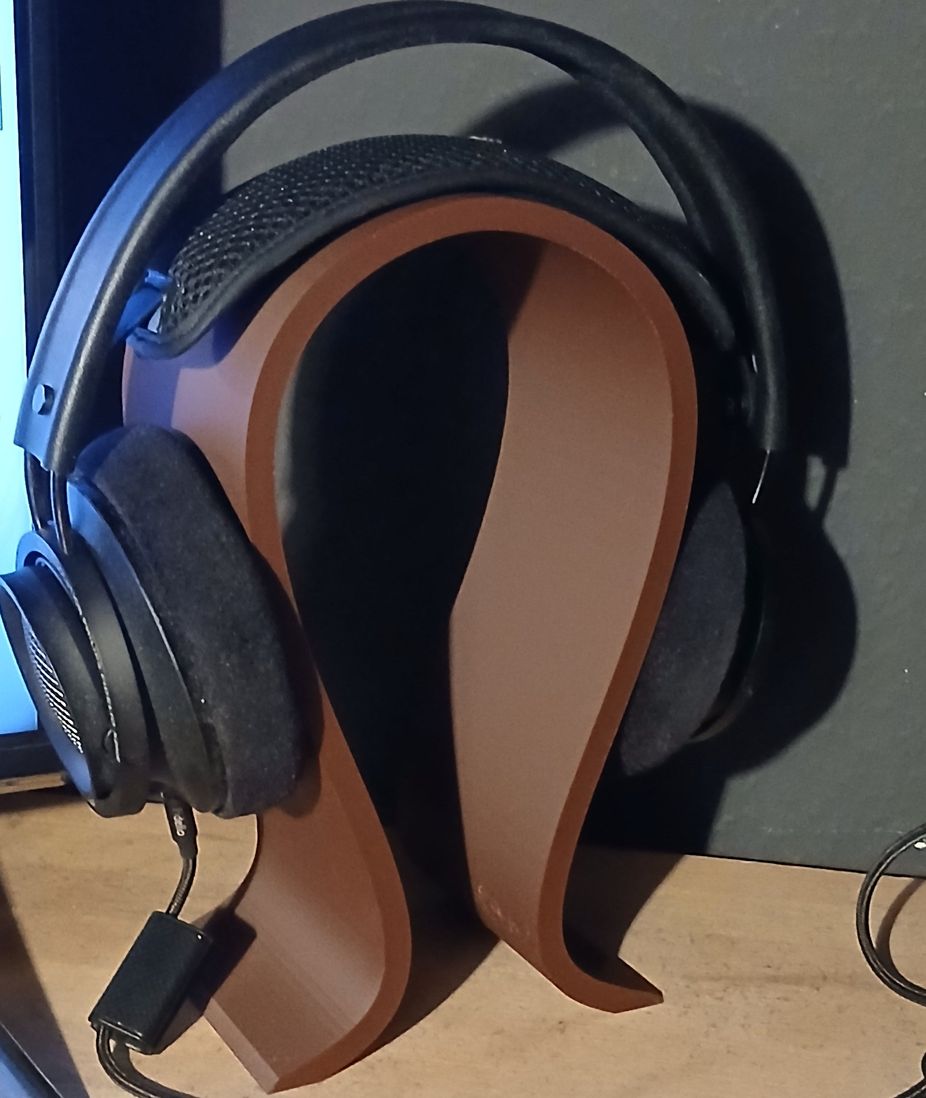 Omega - soporte audifonos